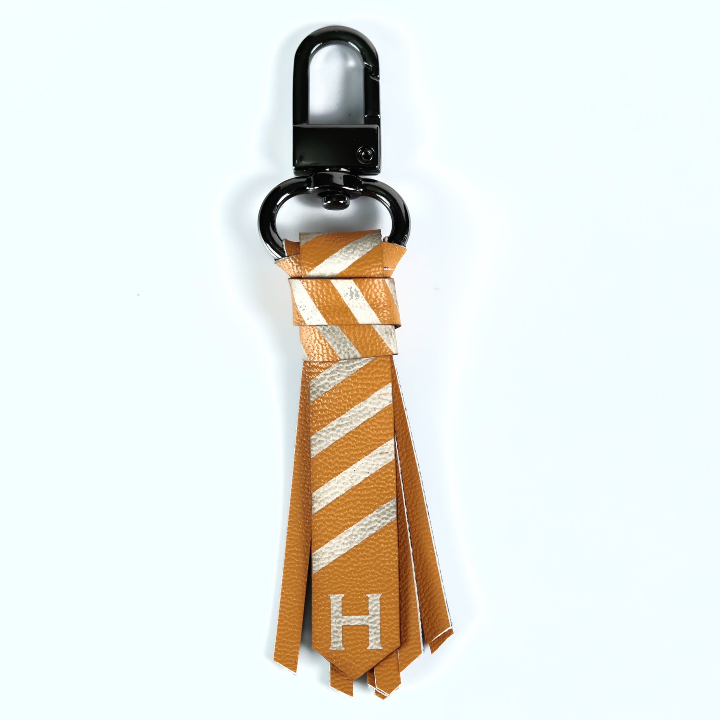 Mini Corbata: Huff. Llavero