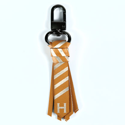 Mini Corbata: Huff. Llavero